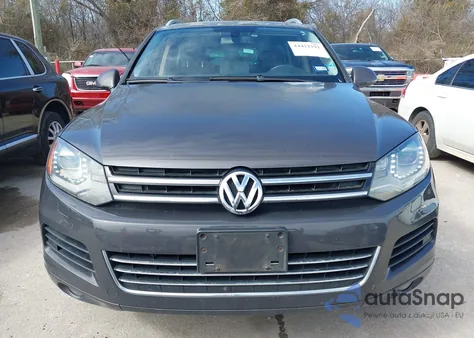 2012 Volkswagen Touareg Tdi Lux z USA, uszkodzony, nr VIN WVGFK9BP7CD002548